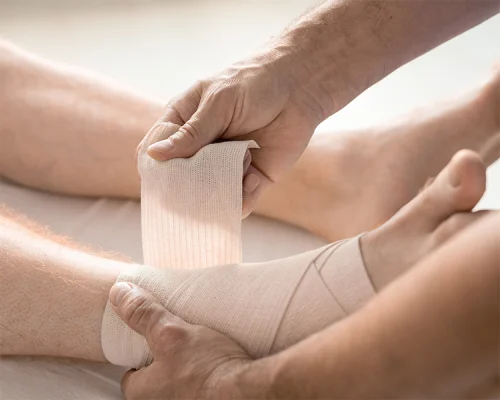 hands of clinician wrapping foot and ankle of pati 2021 09 24 03 24 03 utc hands of clinician wrapping foot and ankle of pati 2021 09 24 03 24 03 utc